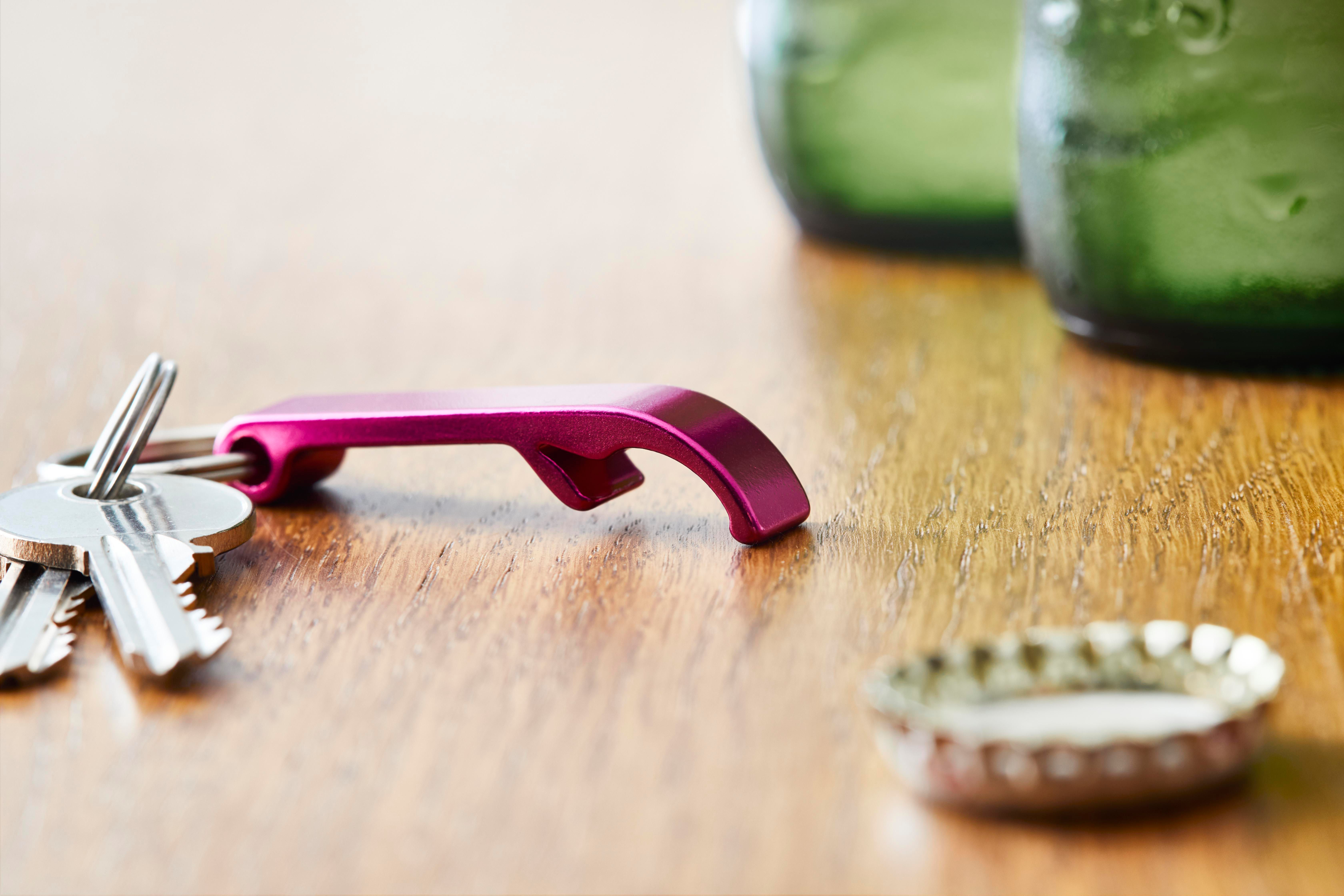 Llavero y abridor de metal Felix